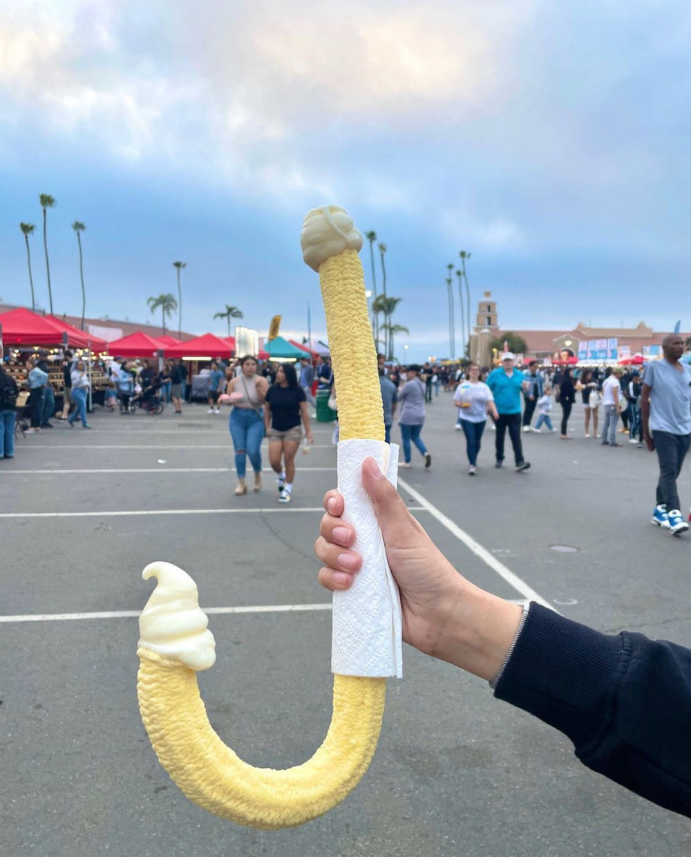 Guest holding Hawaiian Honey Cones